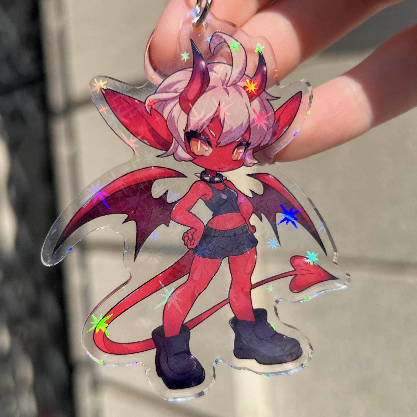 Llavero holográfico de la chica diablillo de Riral